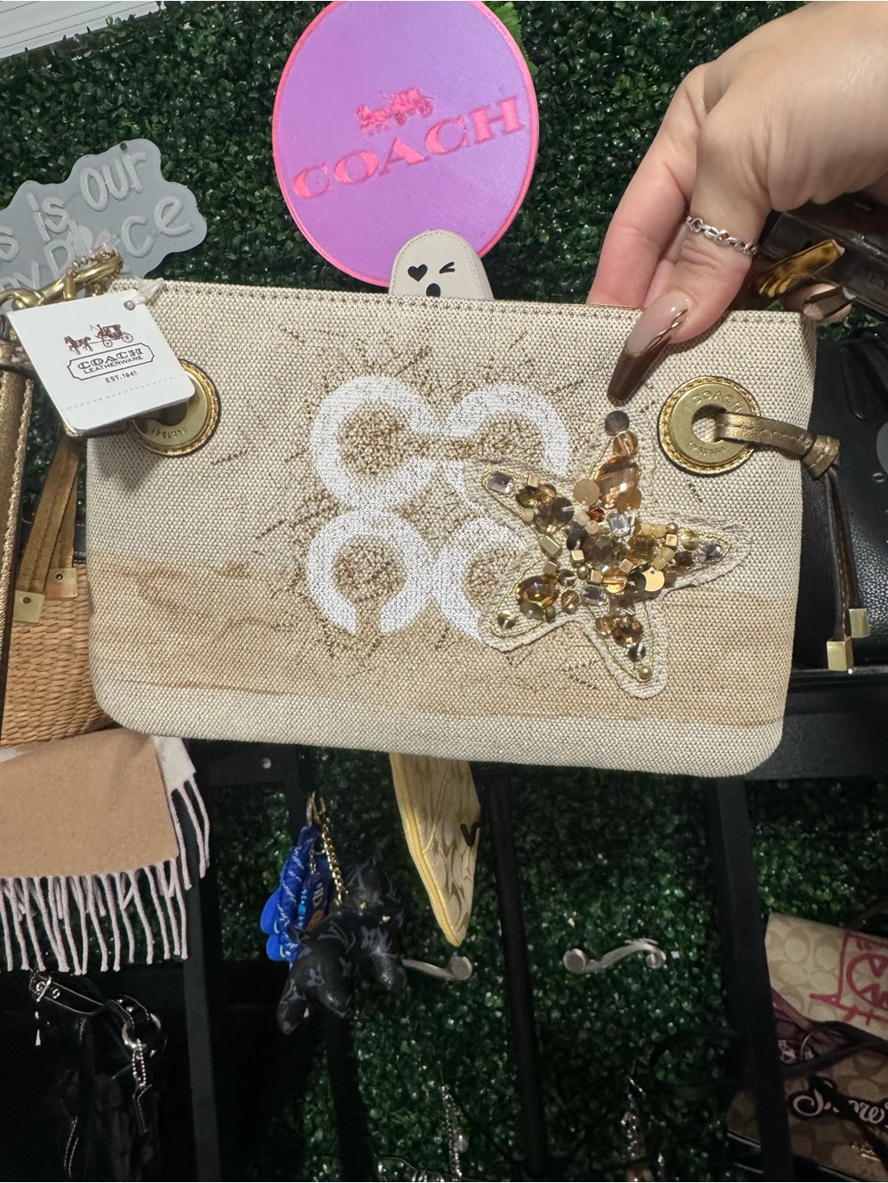 Coach Beige Canvas Wristlet with Gold Sequin Star Accent